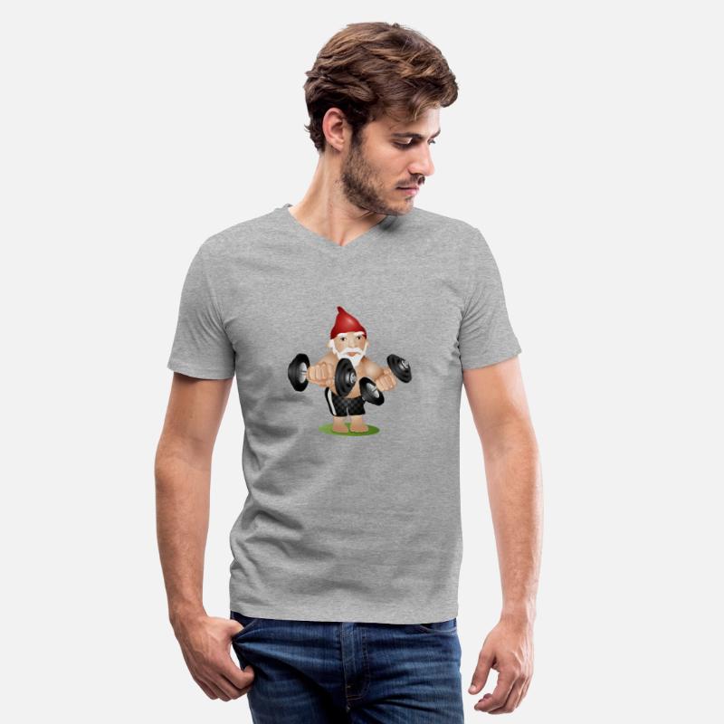 Bodybuilder garden gnome with dumbbells training